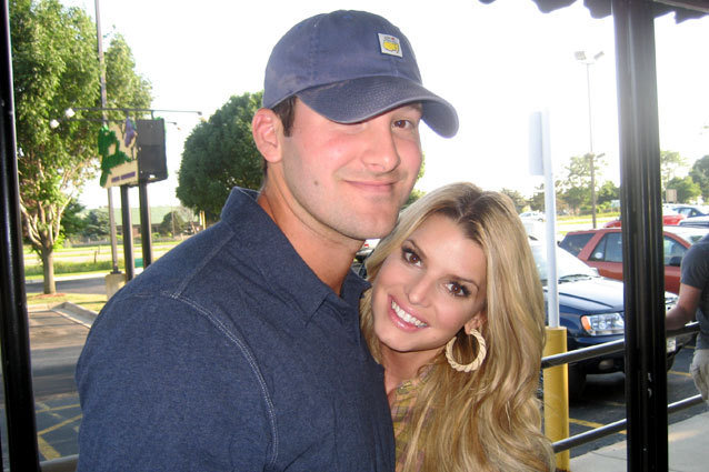 Jessica Simpson and boyfriend Tony Romo are pictured after enjoying a recent dinner with the football star's parents. The group met up at an Olive Garden restaurant in Janesville, Wisconsin on June 27. Romo was in the city to play in a golf competition and the couple were more than happy to pose for fans taking pictures. The couple walked into the restaurant holding hands but left by sneaking through the kitchen. Romo grew up in nearby Burlington.<P><B>Ref: SPL39088 080708 </B><br>Picture by: Splash News</P><P><B>Splash News and Pictures</B><br>Los Angeles: 310-821-2666<br>New York: 212-619-2666<br>London: 870-934-2666<br>photodesk@splashnews.com<br></P> Jessica Simpson, Tony Romo