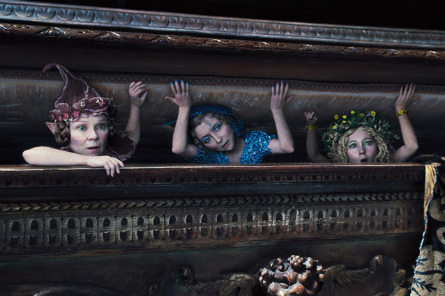 MALEFICENT, l-r: Imelda Staunton, Lesley Manville, Juno Temple, 2014. ?Walt Disney Pictures/courtesy Everett Collection